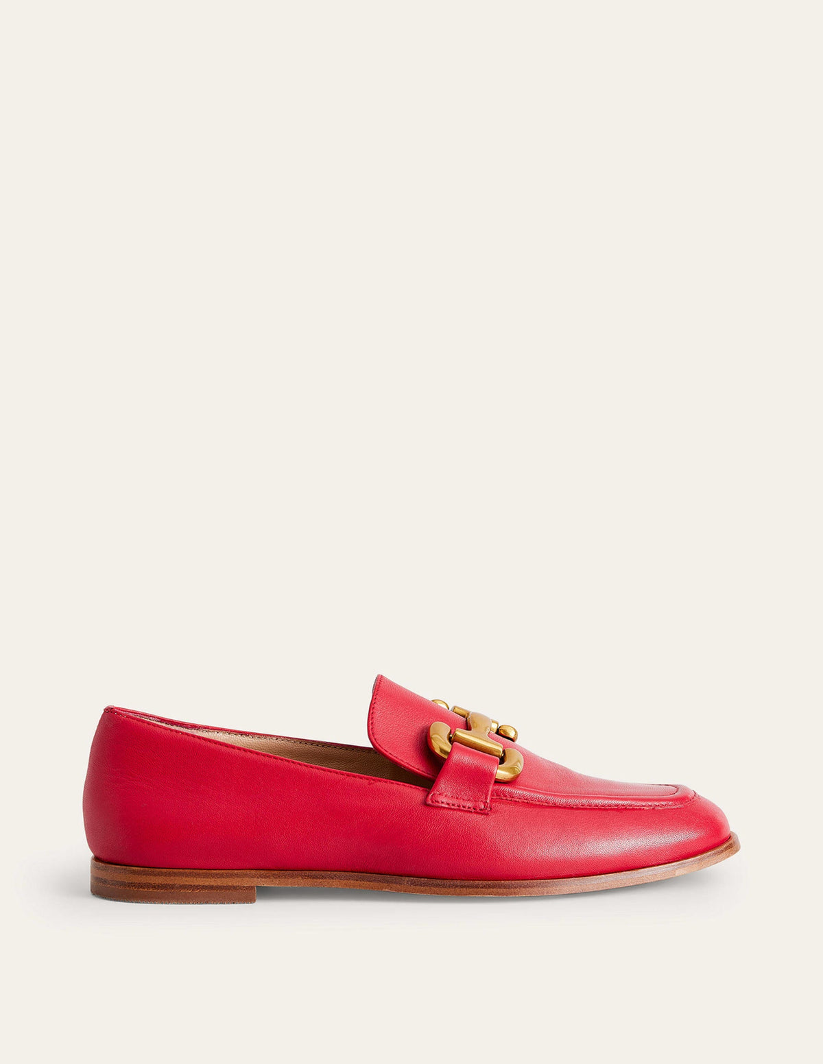 Women's red loafer with gold buckle