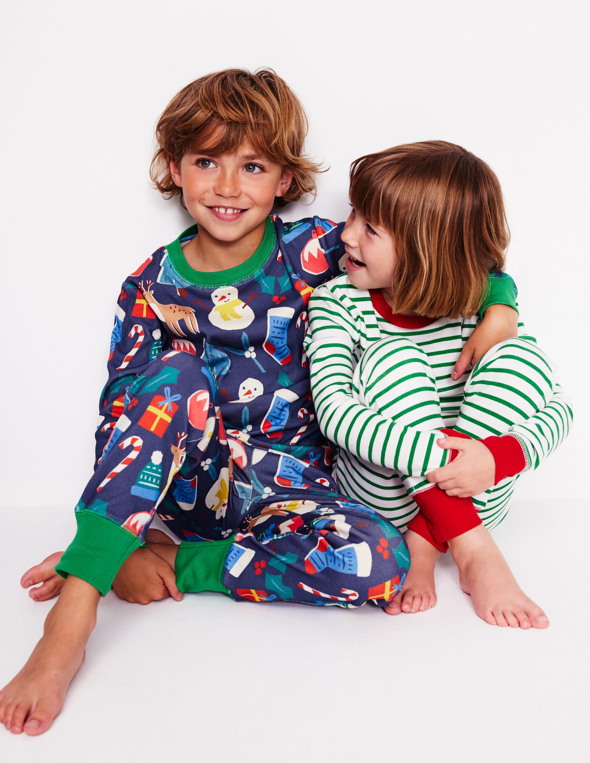 Snug Twin Pack Pyjamas-Christmas Presents and Stripe - Image 4