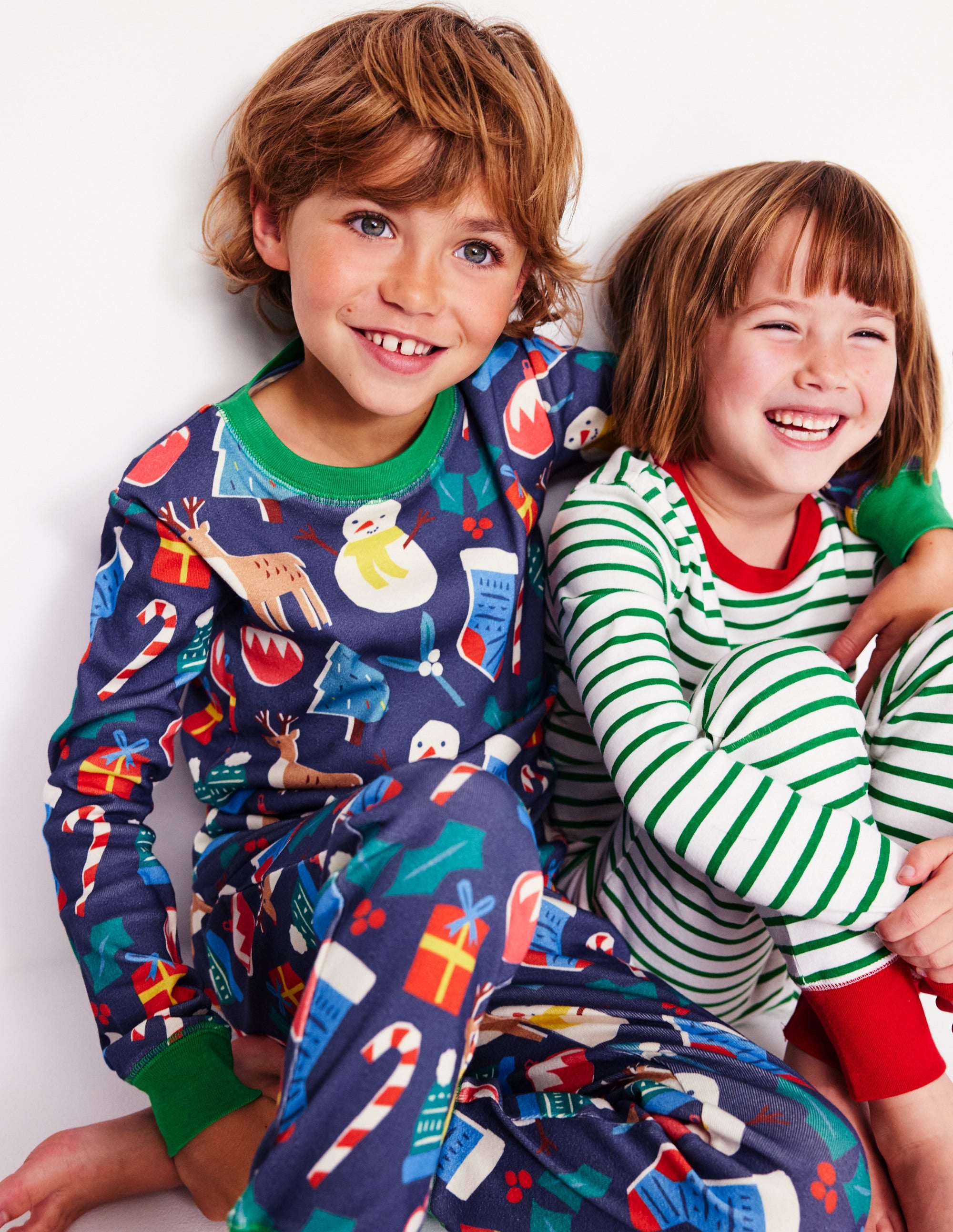 Snug Twin Pack Pyjamas-Christmas Presents and Stripe - Image 5