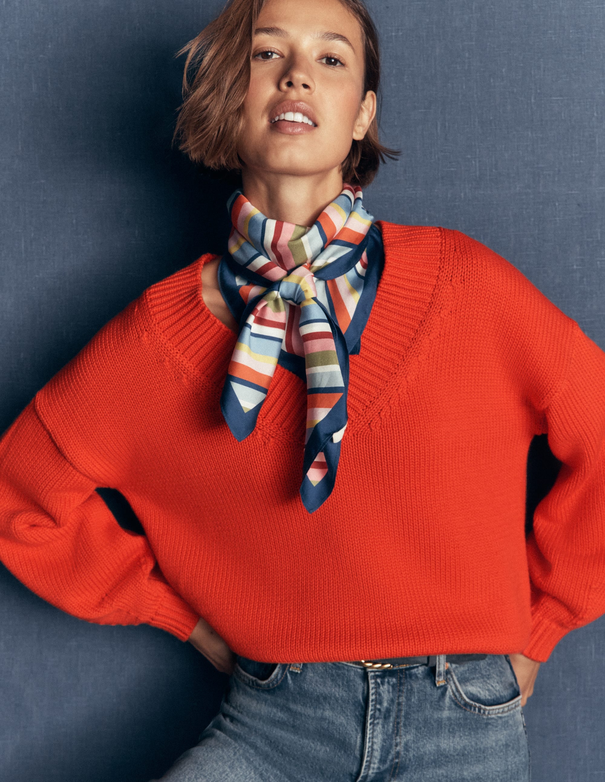 Lucy Cotton V-neck Jumper-Sunset Orange - Image 1