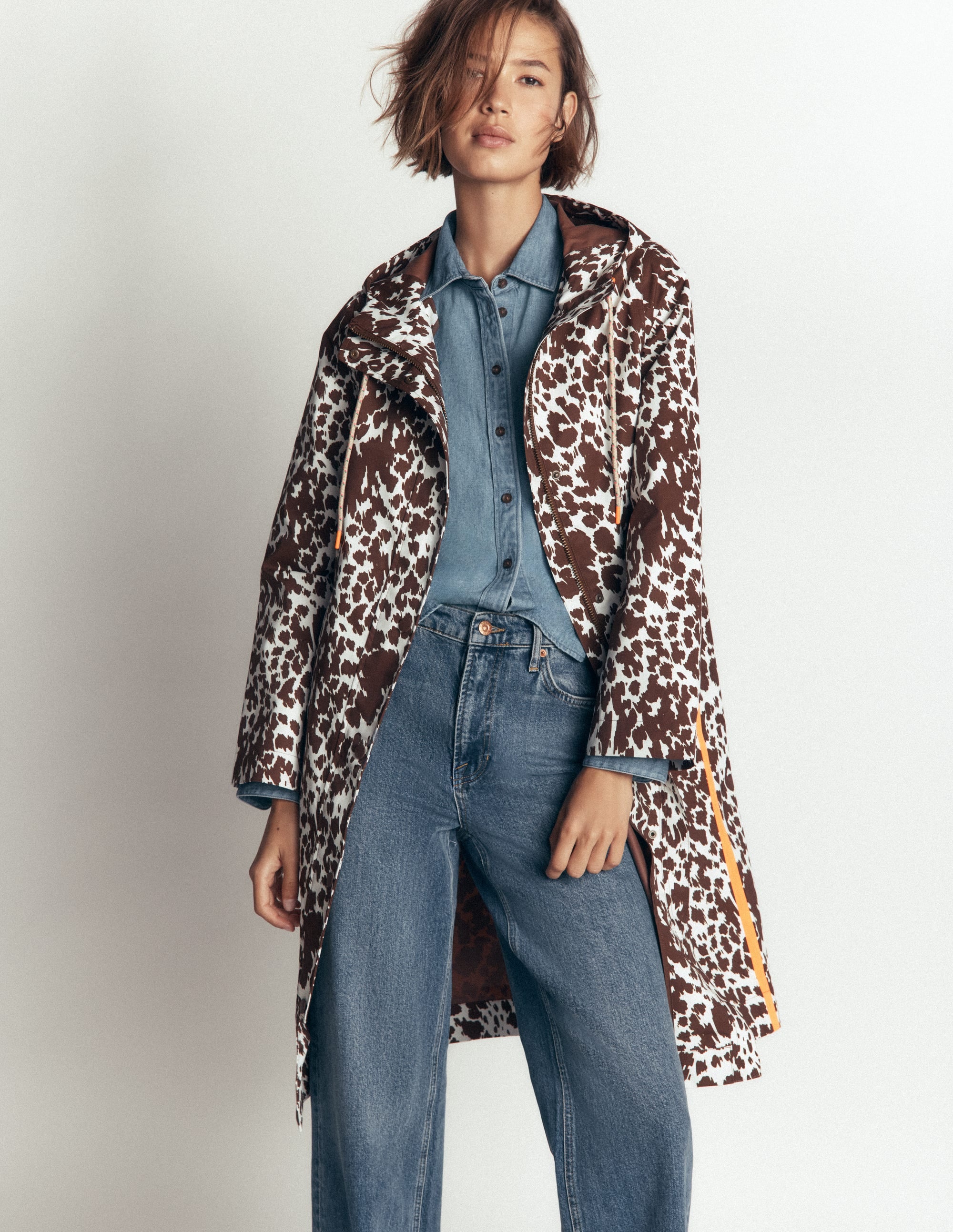 Longline Raincoat-Cow Fields - Image 1
