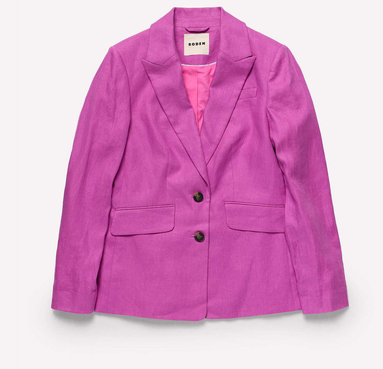 Purple blazer with pink lining on a light gray background
