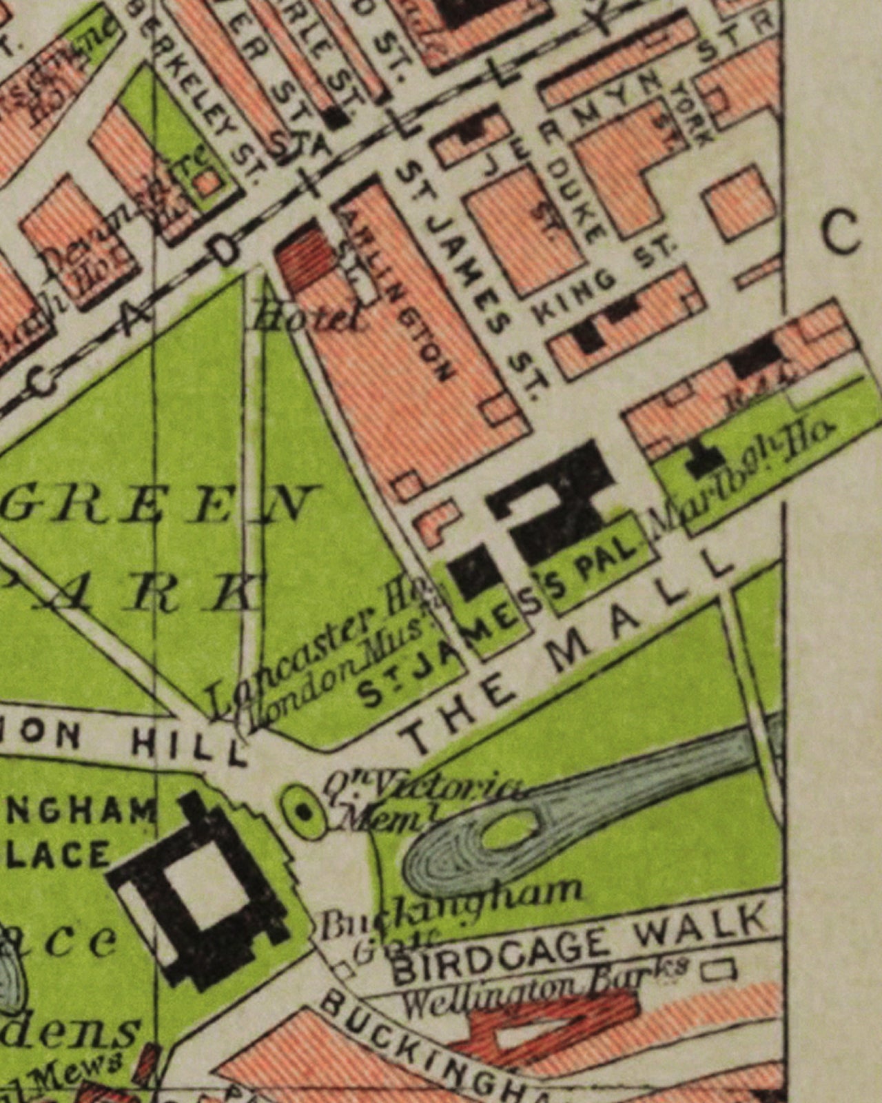 A close-up of a vintage street map showing labeled blocks, green park areas, and a large outlined area marked 'THE MALL'.
