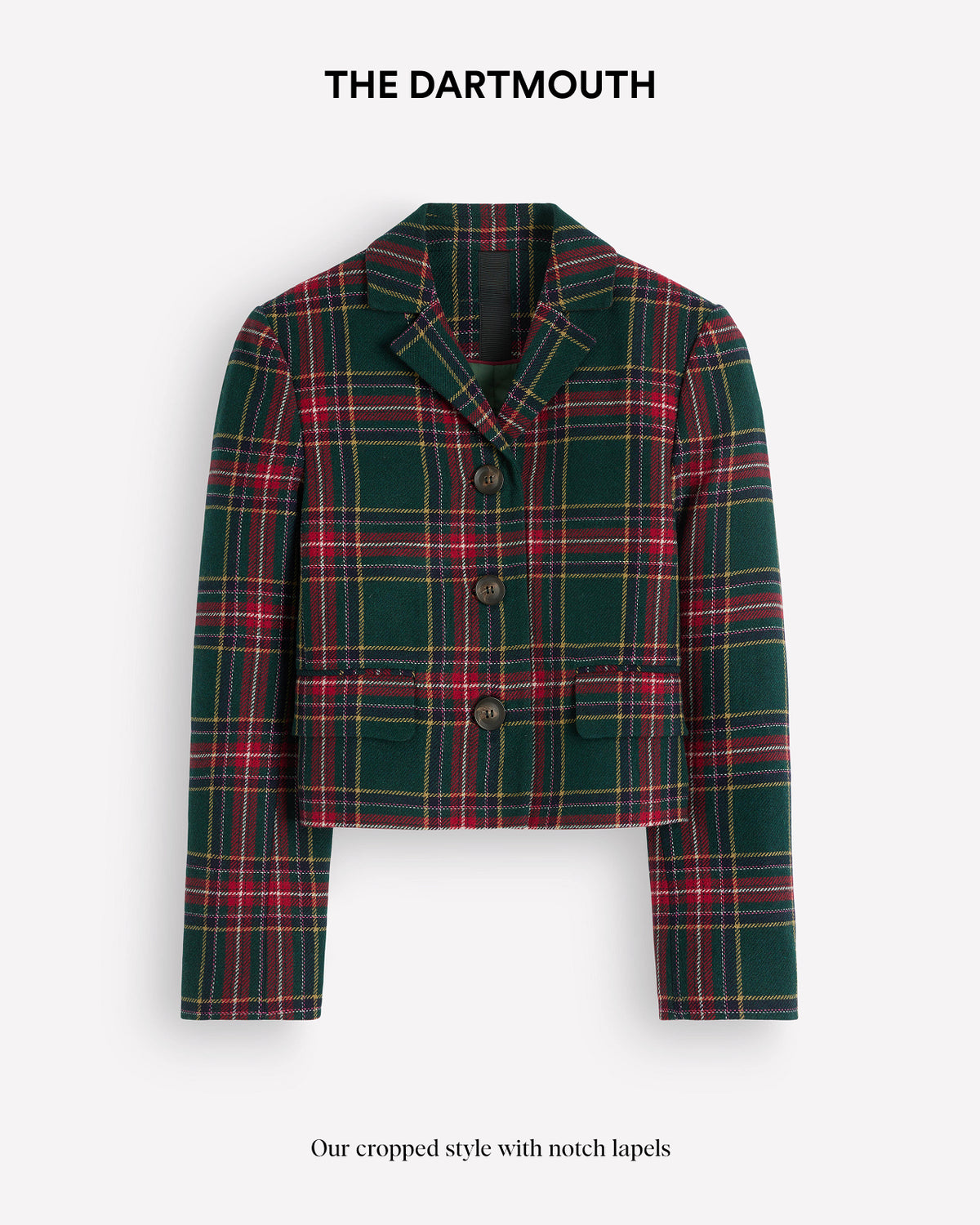 A cropped plaid blazer in dark green with red, yellow, and white tartan lines, featuring notch lapels and a three-button front closure, shown on a light gray background with 'THE DARTMOUTH' text above.
