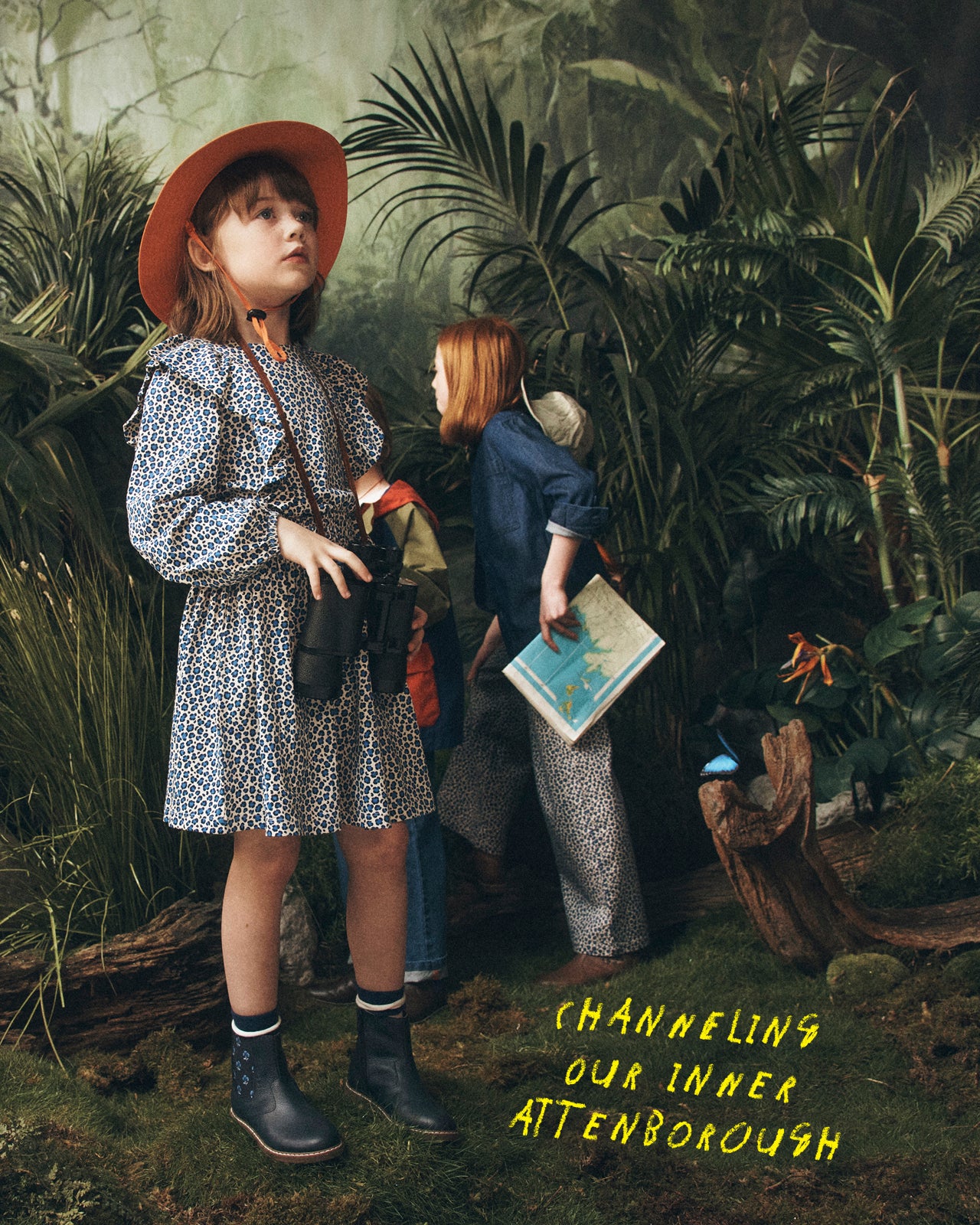 Two children in a jungle setting with text 'Channeling Our Inner Attenborough'.